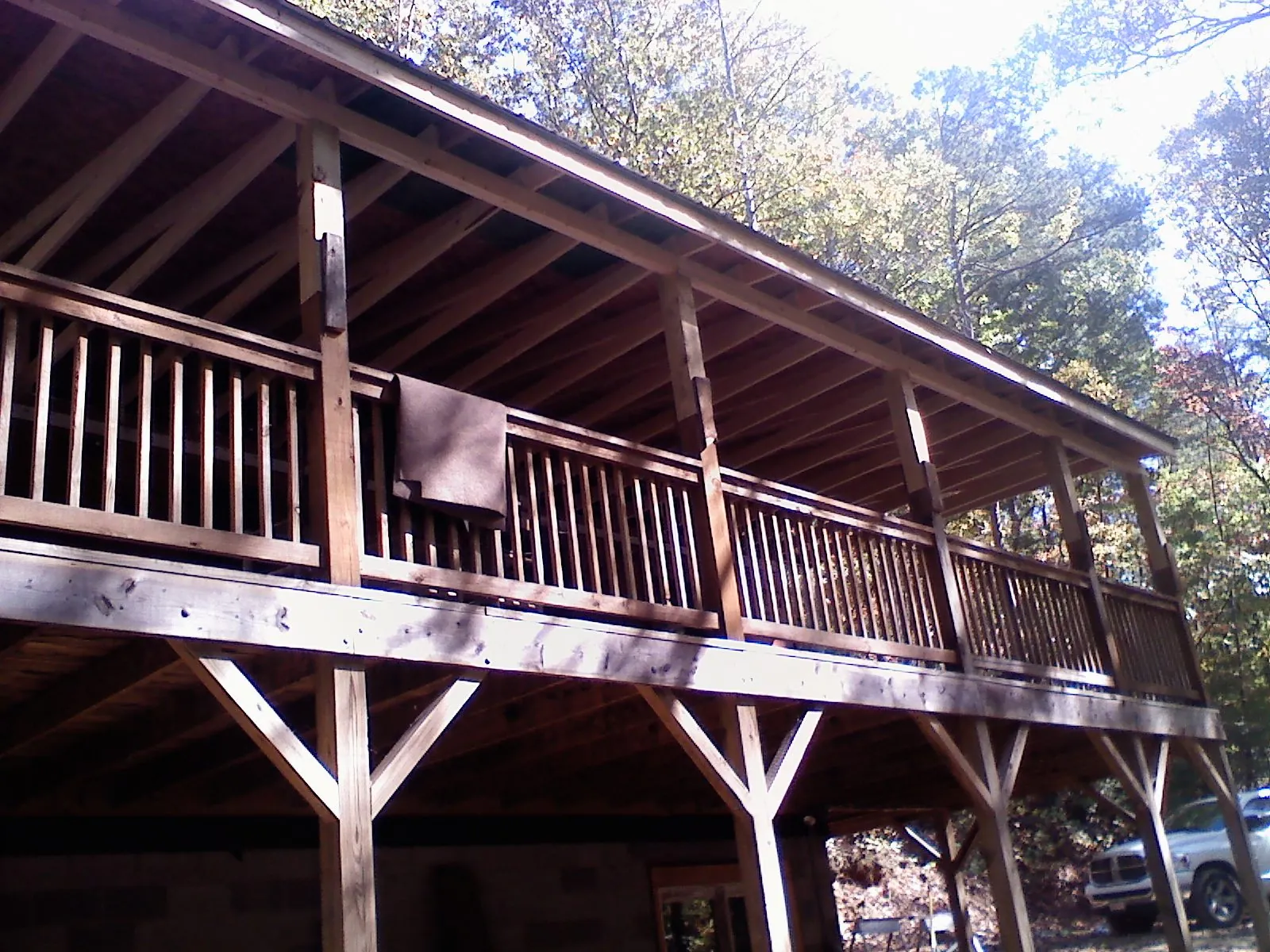 Timber framing under a new elevated porch and deck — Roof Leak Repair in Walla Walla by Roofing Brothers